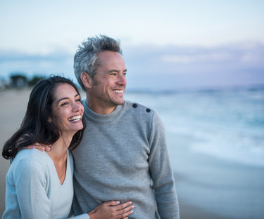 Couple embracing on beach