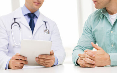 Faceless doctor answering patient questions