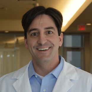 Dr. Christopher Lessard