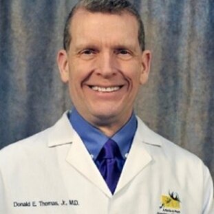 Dr Thomas